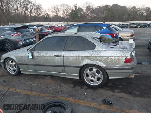 1998 BMW 3 Series 328is with VIN WBABG1329WET06968, listed as a IAAI auction lot 41656215 with 270,000 mi miles. Bid and sale history available at carsss.com. Image 14.