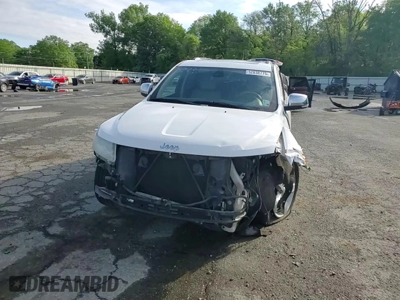2013 Jeep Grand Cherokee Overland with VIN 1C4RJECG8DC526150, listed as a Copart auction lot 52038775 with 183,813 mi miles and Salvage Title. Bid and sale history available at DreamBid. Image 12.