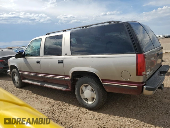 1998 GMC Suburban with VIN 1GKFK16RXWJ721305, listed as a Copart auction lot 64112165 with 197,756 mi miles and Clean title. Bid and sale history available at DreamBid. Image 2.