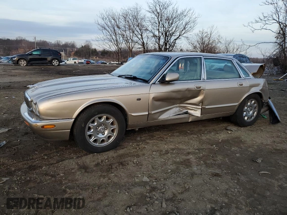 2002 Jaguar XJ 8 with VIN SAJDA14C82LF48116, listed as a Copart auction lot 86444224 with Not provided miles and Salvage title. Bid and sale history available at DreamBid. Image 1.