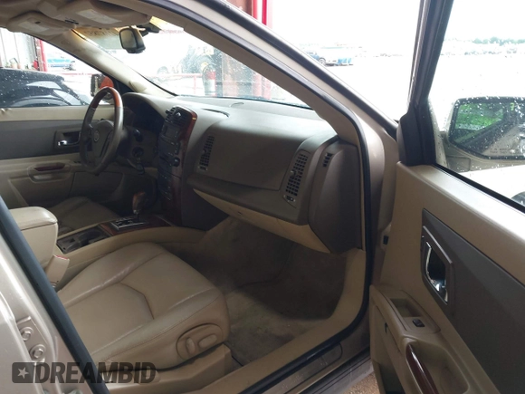 2006 Cadillac SRX z VIN 1GYEE637160193975, wystawiony jako IAAI lot #42187852 z przebiegiem 206 249 mil mil oraz . Historia ofert i sprzedaży dostępna na DreamBid. Obrazek 5.
