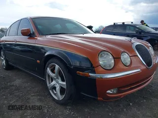 2001 Jaguar S-Type V6 z VIN SAJDA01C51FL84719, wystawiony jako IAAI lot #42192335 z przebiegiem 160 095 mil mil oraz . Historia ofert i sprzedaży dostępna na DreamBid. Obrazek 6.
