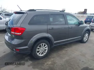 2017 Dodge Journey SXT with VIN 3C4PDCBG3HT618930, listed as a IAAI auction lot 41956400 with 106,185 mi miles and . Bid and sale history available at carsss.com. Image 4.