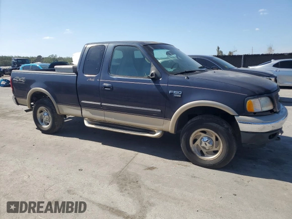 2000 Ford F-150 XL with VIN 1FTRX18L0YNB65908, listed as a Copart auction lot 54797585 with 298,924 mi miles and Clean title. Bid and sale history available at DreamBid. Image 4.