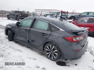 2024 Honda Civic EX-L z VIN 19XFL1H7XRE000407, wystawiony jako IAAI lot #41331186 z przebiegiem 22 764 mil mil oraz . Historia ofert i sprzedaży dostępna na DreamBid. Obrazek 3.