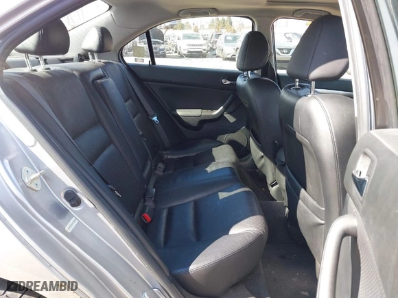 2005 Acura TSX with VIN JH4CL96825C014332, listed as a IAAI auction lot 41695332 with 142282 miles. Bid and sale history available at carsss.com. Image 8.