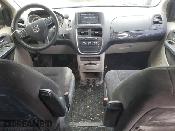 2015 Dodge Grand Caravan SE with VIN 2C4RDGBG7FR516773, listed as a Copart auction lot 52035135 with 132,122 mi miles and Salvage Title. Bid and sale history available at DreamBid. Image 8.