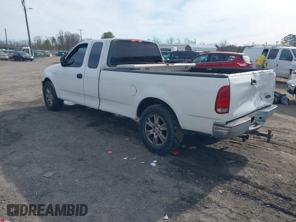2000 Ford F-150 XL with VIN 1FTRX17LXYNC39983, listed as a IAAI auction lot 41750277 with 170,016 mi miles. Bid and sale history available at carsss.com. Image 3.