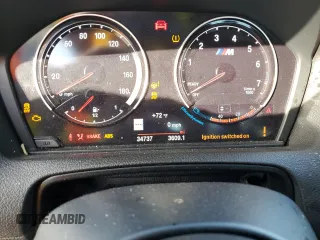2018 BMW M2 z VIN WBS1J5C50JVE51970, wystawiony jako Copart lot #41458203 z przebiegiem 34 737 mil mil oraz . Historia ofert i sprzedaży dostępna na DreamBid. Obrazek 9.