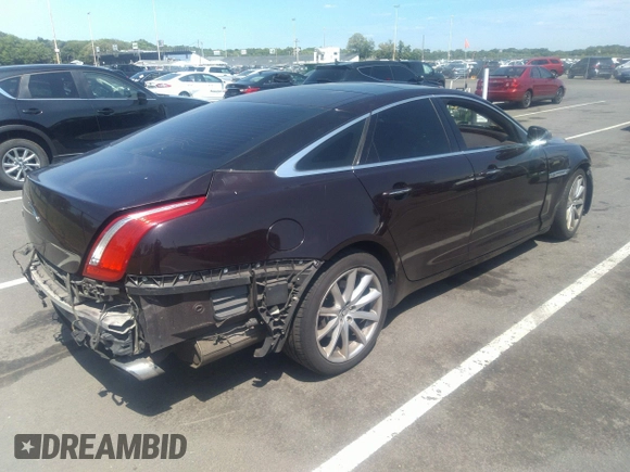 2011 Jaguar XJ with VIN SAJWA1CB5BLV09952, listed as a IAAI auction lot 41435624 with 114,892 mi miles and . Bid and sale history available at DreamBid. Image 4.