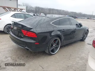2013 Audi A7 3.0 Prestige with VIN WAU2GAFC4DN021984, listed as a IAAI auction lot 41687095 with 55,307 mi miles. Bid and sale history available at carsss.com. Image 4.