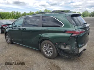 2021 Toyota Sienna LE with VIN 5TDBSKFC4MS027897, listed as a Copart auction lot 56052375 with 66,604 mi miles and Salvage title. Bid and sale history available at DreamBid. Image 2.