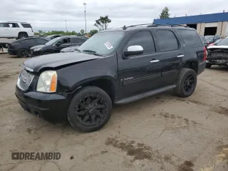 2009 GMC Yukon SLT 4SB z VIN 1GKFK33049R282898, wystawiony jako Copart lot #57970325 z przebiegiem 174 379 mil mil oraz Czysty tytuł • Clean title. Historia ofert i sprzedaży dostępna na DreamBid. Obrazek 1.