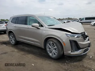 2022 Cadillac XT6 Premium Luxury with VIN 1GYKPDRS5NZ180296, listed as a Copart auction lot 59081184 with 21,380 mi miles and Salvage title. Bid and sale history available at DreamBid. Image 4.