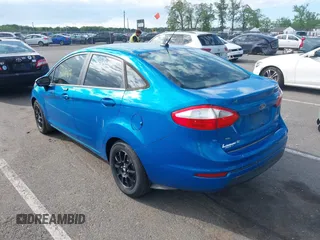 2015 Ford Fiesta SE z VIN 3FADP4BJ6FM125929, wystawiony jako IAAI lot #42181609 z przebiegiem 136 388 mil mil oraz . Historia ofert i sprzedaży dostępna na DreamBid. Obrazek 3.