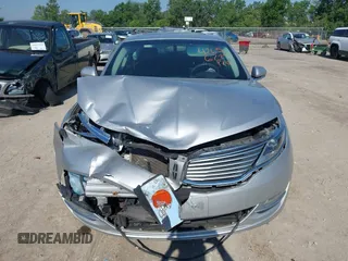 2014 Lincoln MKZ Hybrid with VIN 3LN6L2LU5ER822663, listed as a IAAI auction lot 42656735 with 122,025 mi miles and . Bid and sale history available at DreamBid. Image 12.