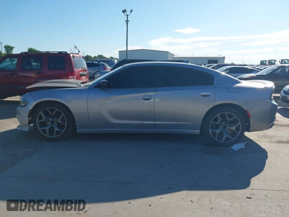 2015 Dodge Charger SXT with VIN 2C3CDXHG8FH884080, listed as a IAAI auction lot 42230385 with 151,948 mi miles and . Bid and sale history available at DreamBid. Image 14.
