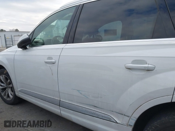2019 Audi Q7 Premium Plus with VIN WA1LHAF79KD033844, listed as a IAAI auction lot 41431801 with 108,165 mi miles and . Bid and sale history available at DreamBid. Image 13.