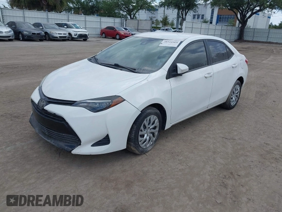 2019 Toyota Corolla L with VIN 5YFBURHE7KP908794, listed as a IAAI auction lot 38524964 with 65,069 mi miles. Bid and sale history available at carsss.com. Image 2.