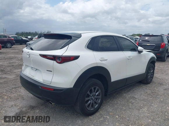 2021 Mazda CX-30 S with VIN 3MVDMAAL3MM228581, listed as a IAAI auction lot 42008198 with 44,132 mi miles and . Bid and sale history available at DreamBid. Image 4.