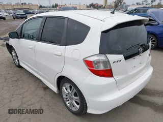 2009 Honda Fit Sport with VIN JHMGE88409S021730, listed as a IAAI auction lot 42045023 with 309,995 mi miles. Bid and sale history available at carsss.com. Image 3.