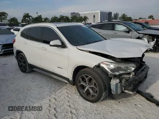 2016 BMW X1 xDrive28i z VIN WBXHT3C3XGP884843, wystawiony jako Copart lot #50605845 z przebiegiem 115 197 mil mil oraz Nie do naprawy • Non repairable. Historia ofert i sprzedaży dostępna na DreamBid. Obrazek 4.