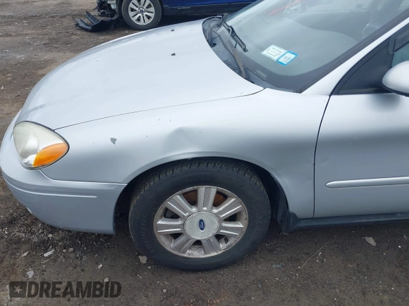 2005 Ford Taurus SEL z VIN 1FAFP56245A233415, wystawiony jako IAAI lot #42225619 z przebiegiem 145 658 mil mil oraz . Historia ofert i sprzedaży dostępna na DreamBid. Obrazek 6.