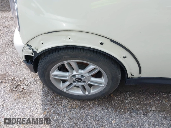 2012 MINI Convertible with VIN WMWZN3C51CT134646, listed as a IAAI auction lot 42252740 with 124,278 mi miles and . Bid and sale history available at DreamBid. Image 6.