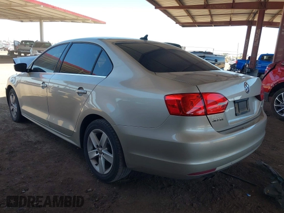 2014 Volkswagen Jetta TDI w/Premium with VIN 3VWLL7AJ1EM228062, listed as a IAAI auction lot 42256650 with 218,955 mi miles and . Bid and sale history available at DreamBid. Image 3.