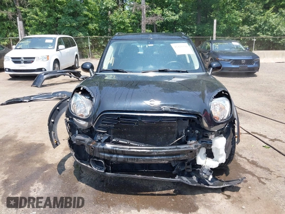 2015 MINI Countryman S with VIN WMWZC5C56FWP45115, listed as a IAAI auction lot 42426394 with 52,937 mi miles and . Bid and sale history available at DreamBid. Image 13.