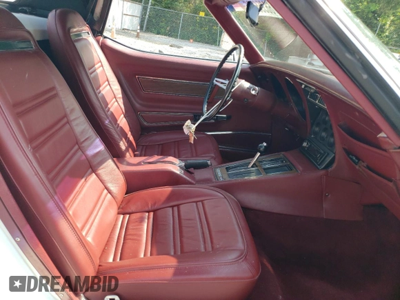 1974 Chevrolet Corvette with VIN 1Z67J4S405054, listed as a Copart auction lot 66356575 with 7,810 mi miles and Salvage title. Bid and sale history available at DreamBid. Image 10.