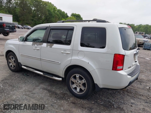 2011 Honda Pilot Touring z VIN 5FNYF4H9XBB053966, wystawiony jako IAAI lot #42148528 z przebiegiem 191 939 mil mil oraz . Historia ofert i sprzedaży dostępna na DreamBid. Obrazek 3.