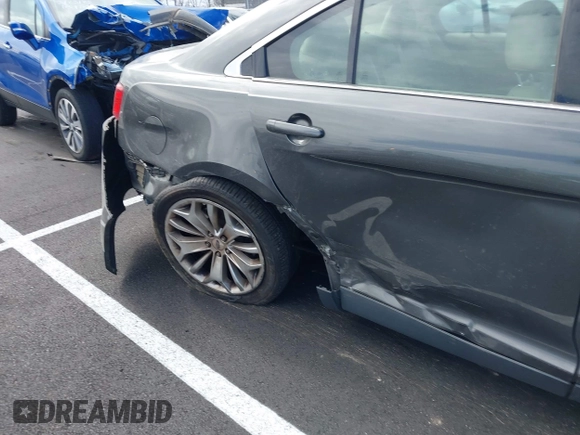 2016 Ford Taurus Limited with VIN 1FAHP2F81GG113289, listed as a IAAI auction lot 41883906 with 166,682 mi miles and . Bid and sale history available at DreamBid. Image 6.