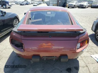 1986 Porsche 928 z VIN WP0JB0924GS860517, wystawiony jako Copart lot #58575324 z przebiegiem 105 961 mil mil oraz Szkody całkowita. Historia ofert i sprzedaży dostępna na DreamBid. Obrazek 6.