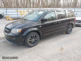 2014 Dodge Grand Caravan SE with VIN 2C4RDGBG1ER362169, listed as a IAAI auction lot 42011429 with 182,470 mi miles. Bid and sale history available at carsss.com. Image 2.