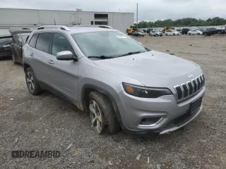 2019 Jeep Cherokee Limited with VIN 1C4PJMDX6KD216537, listed as a Copart auction lot 61259515 with 59,422 mi miles and Salvage title. Bid and sale history available at DreamBid. Image 4.