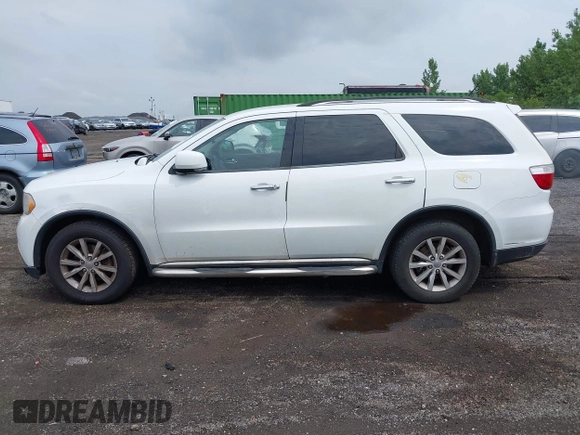 2013 Dodge Durango Crew with VIN 1C4RDJDG9DC667338, listed as a IAAI auction lot 42639559 with 137,020 mi miles and . Bid and sale history available at DreamBid. Image 14.