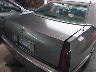 1999 Cadillac Eldorado ESC z VIN 1G6EL12Y8XU612393, wystawiony jako IAAI lot #41761839 z przebiegiem 104 994 mil mil oraz . Historia ofert i sprzedaży dostępna na DreamBid. Obrazek 6.