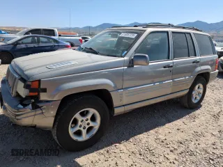1998 Jeep Grand Cherokee Limited z VIN 1J4GZ88Z8WC306919, wystawiony jako Copart lot #61505725 z przebiegiem 195 329 mil mil oraz Czysty tytuł • Clean title. Historia ofert i sprzedaży dostępna na DreamBid. Obrazek 1.