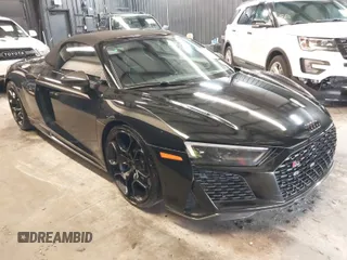 2022 Audi R8 Spyder performance z VIN WUA4BCFX8N7900499, wystawiony jako IAAI lot #41521321 z przebiegiem 12 100 mil mil oraz . Historia ofert i sprzedaży dostępna na DreamBid. Obrazek 1.