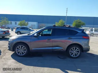 2019 Acura RDX w/Technology Pkg with VIN 5J8TC2H51KL000186, listed as a IAAI auction lot 41403335 with 140,920 mi miles. Bid and sale history available at carsss.com. Image 13.