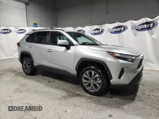 2022 Toyota RAV4 Hybrid XLE Premium with VIN 4T3B6RFV1NU080099, listed as a Copart auction lot 60206905 with 59,859 mi miles and Clean title. Bid and sale history available at DreamBid. Image 4.
