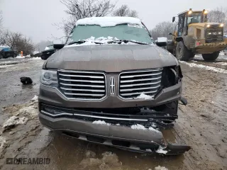 2015 Lincoln Navigator with VIN 5LMJJ2JT7FEJ14653, listed as a Copart auction lot 44921315 with 112,183 mi miles and Salvage Title. Bid and sale history available at carsss.com. Image 5.