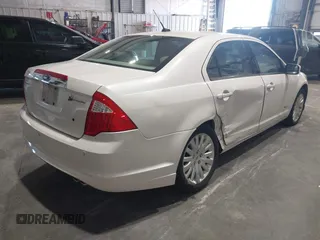 2010 Ford Fusion Hybrid with VIN 3FADP0L30AR152547, listed as a IAAI auction lot 42191154 with 105,180 mi miles. Bid and sale history available at carsss.com. Image 4.