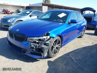 2020 BMW 3 Series 330i with VIN WBA5R1C05LFH66384, listed as a IAAI auction lot 41810255 with 59,433 mi miles. Bid and sale history available at carsss.com. Image 2.