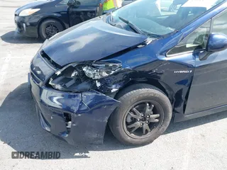 2015 Toyota Prius Four with VIN JTDKN3DU4F0470775, listed as a IAAI auction lot 42254233 with 125,495 mi miles and . Bid and sale history available at DreamBid. Image 6.