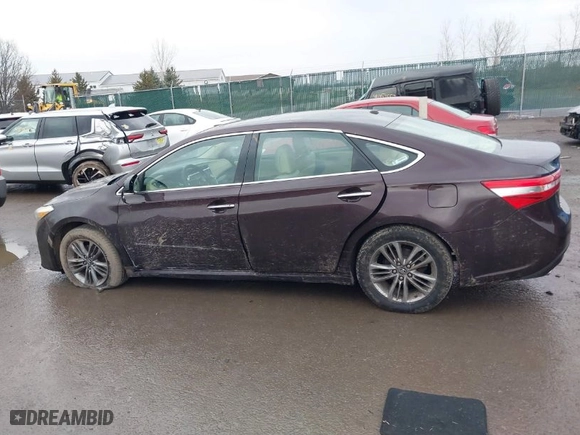 2014 Toyota Avalon Limited with VIN 4T1BK1EB4EU124593, listed as a IAAI auction lot 41064543 with 267,959 mi miles. Bid and sale history available at carsss.com. Image 14.