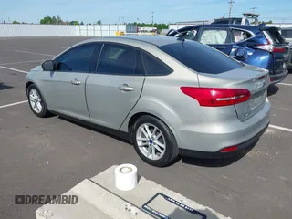 2015 Ford Focus SE z VIN 1FADP3F29FL206003, wystawiony jako IAAI lot #42187898 z przebiegiem 149 560 mil mil oraz . Historia ofert i sprzedaży dostępna na DreamBid. Obrazek 3.