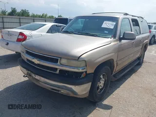 2001 Chevrolet Suburban LS z VIN 3GNEC16T21G214738, wystawiony jako IAAI lot #42433747 z przebiegiem Nie podano mil oraz . Historia ofert i sprzedaży dostępna na DreamBid. Obrazek 2.