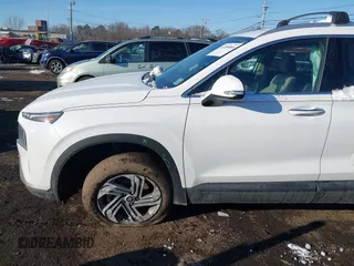 2023 Hyundai Santa Fe SEL z VIN 5NMS2DAJ8PH640338, wystawiony jako IAAI lot #41394066 z przebiegiem 19 064 mil mil oraz . Historia ofert i sprzedaży dostępna na DreamBid. Obrazek 6.